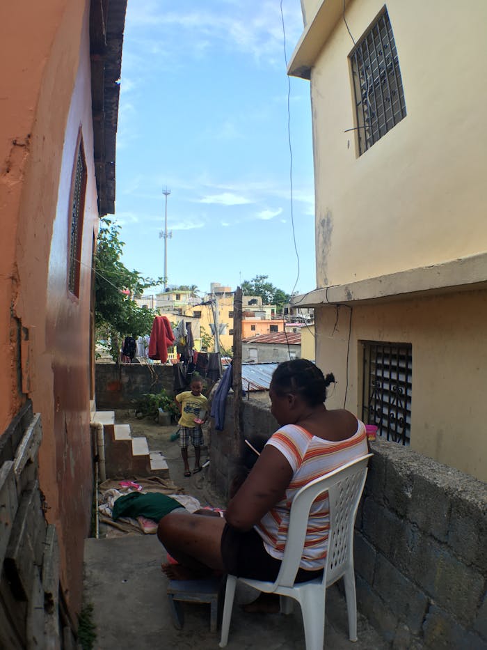 Street scene in Santo Domingo capturing daily life with local residents.