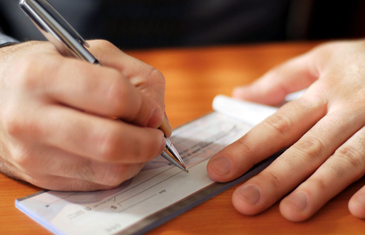 emision de cheques impuestos